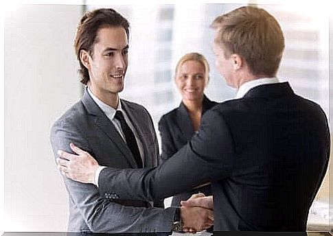 two men shaking hands