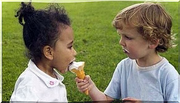 Boy gives girl ice cream as he is a good person