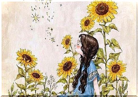 a girl enjoys summer among sunflowers