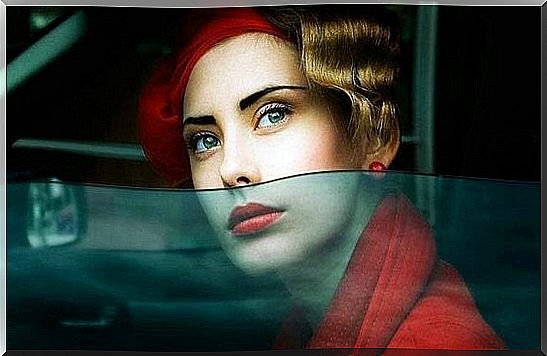 Woman in car looking out of window