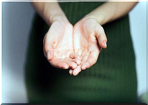 Woman reaching out her hands