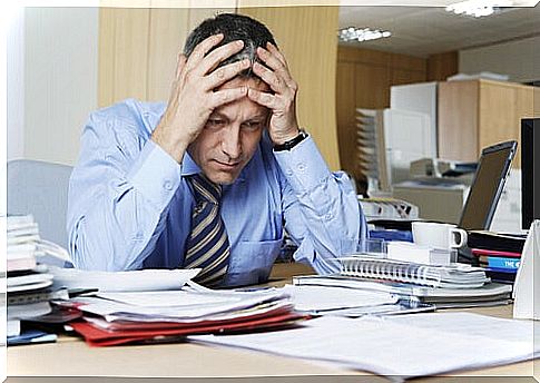 Man in office gets gray hair due to stress