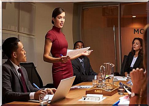 Woman giving speech at meeting