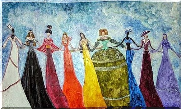 Women in long dresses in the colors of the rainbow