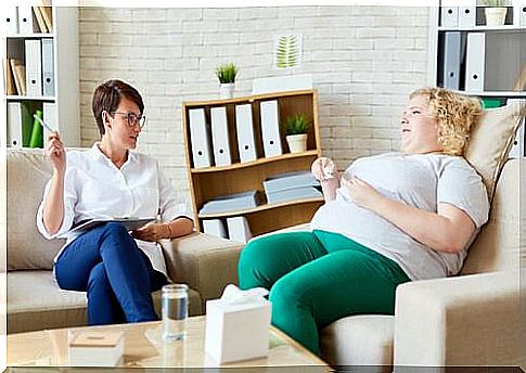 overweight woman gets advice from her psychologist