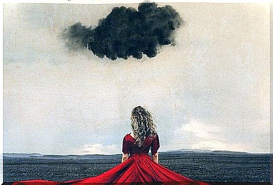 Woman walking under black cloud