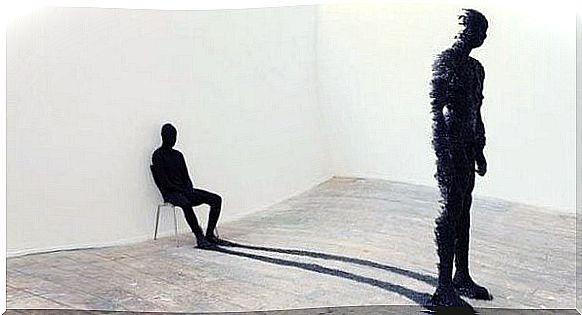 Large figure stands with seated shadow