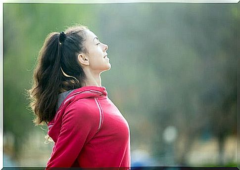 Woman stretching after exercising