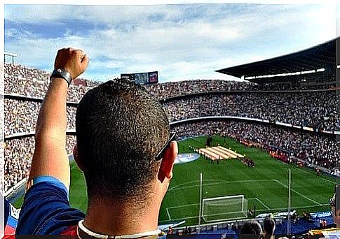 Football fan in front of the stadium